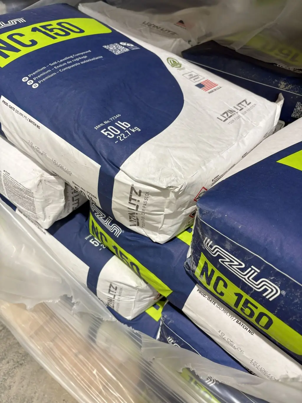 Pallet of Uzin NC 150 premium self-leveling compound in 50 lb bags at Sundry Pro Shop